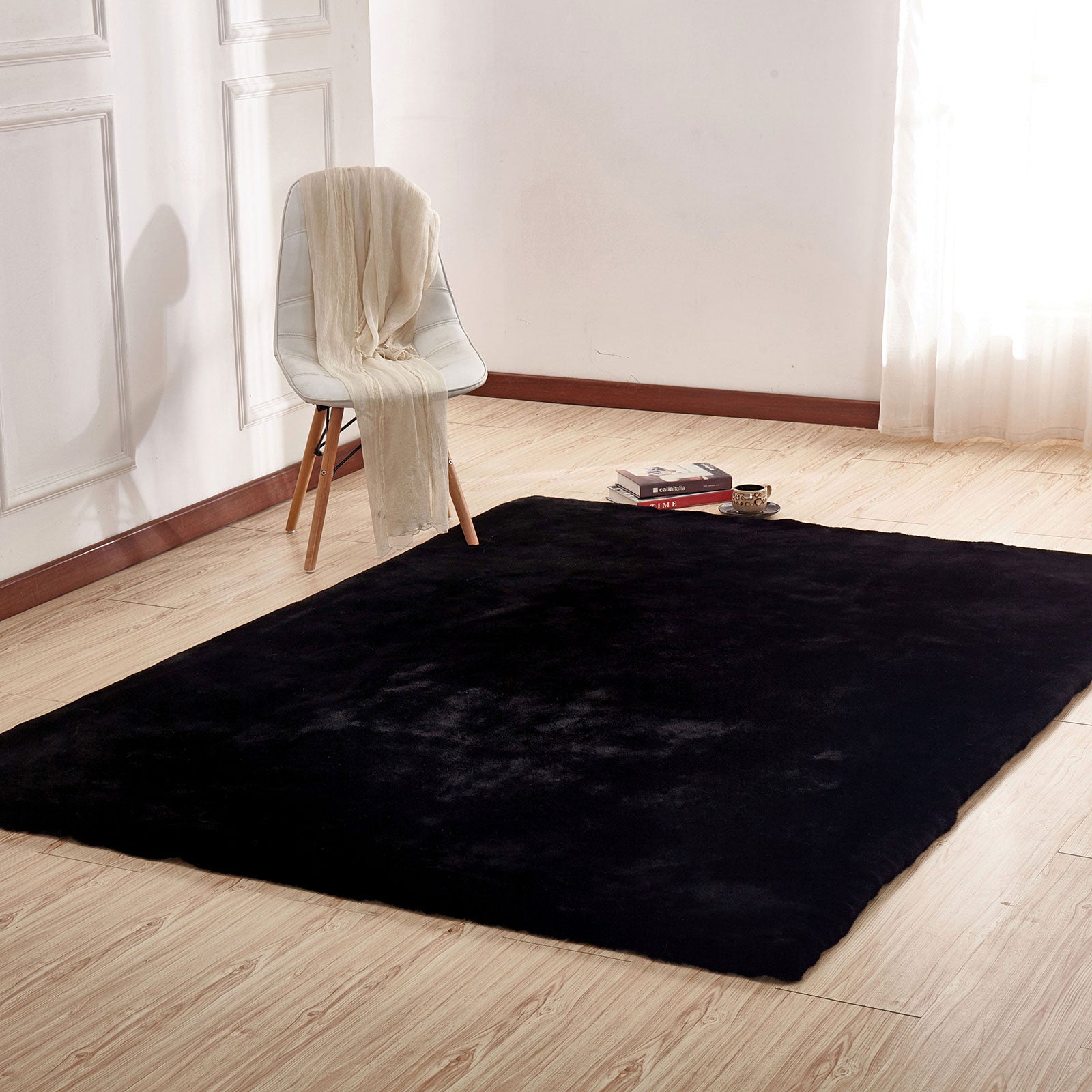 Caparica Black 5' X 7' Area Rug - ATL FURNITURE